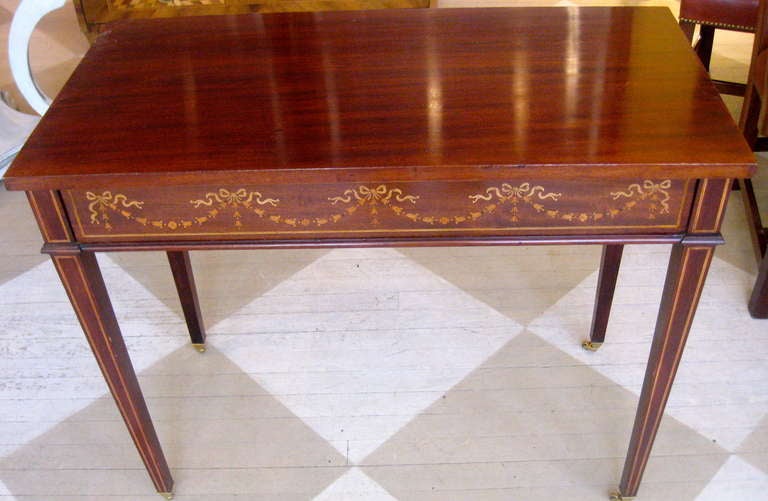 19th century English mahogany and satinwood writing table.