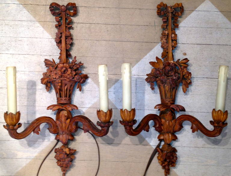 Pair of 19th Century French Hand Carved Wooden Sconces with Basket of Flowers and Bow