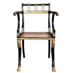 A Single Black & Gilt Regency Armchair