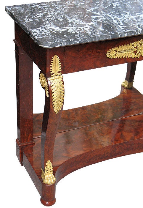 Matching pair of magnificent Empire console tables