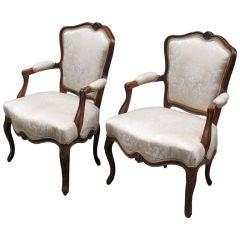 Pair of French Rococo Walnut Armchairs or Bergeres