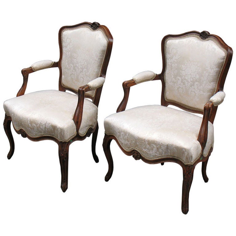 Pair of French Rococo Walnut Armchairs or Bergeres For Sale