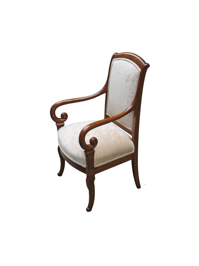 Solid mahogany frame with padded seat and back, down-swept scrolled arms and characteristically shaped front legs.  

References are included in our "CERTIFICATE OF AUTHENTICITY"

Ritter Antik is dealing in authentic Continental period