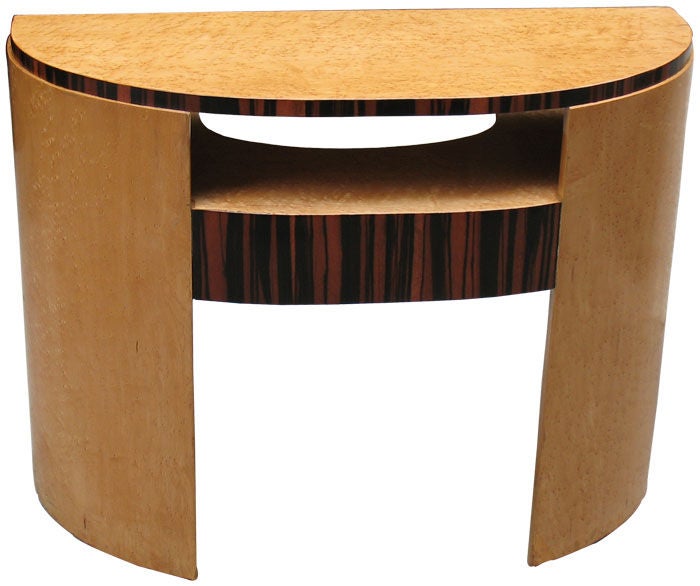 An identically designed vanity table (poudreuse) by Henri Kahn is illustrated in 