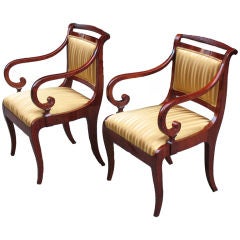 A pair of English influenced elegant Biedermeier armchairs