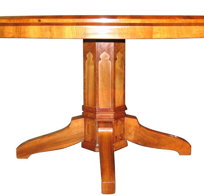 large diameter German Biedermeier dining table to seat 8 people. Walnut veneered on pine in matching pattern. Octagonal pedestal with Gothic motifs. Four splayed legs.

References are included in our 'CERTIFICATE OF AUTHENTICITY'

Ritter Antik