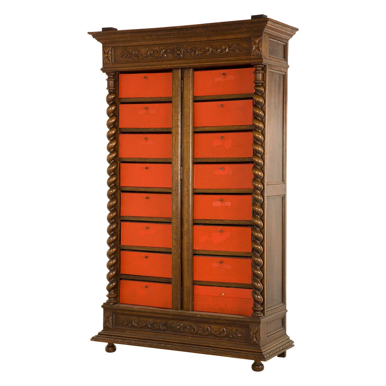 antique cabinet. hand carved details. removable red paper filing boxes.