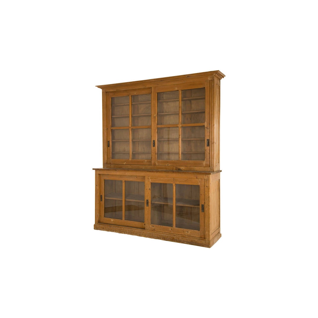 antique breakfront. salvaged from a french laboratory. oak. glass pane sliding doors.