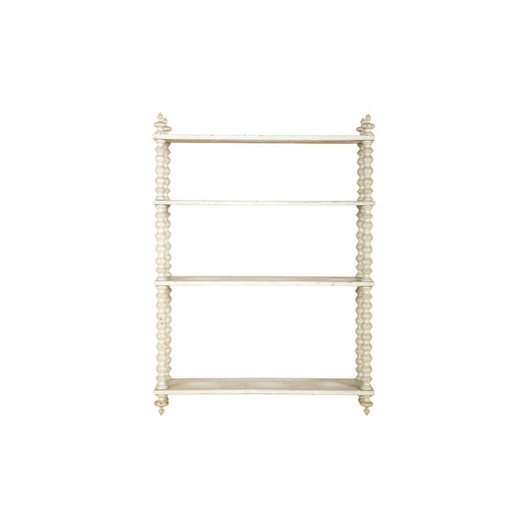 antique spindle shelf. painted finish as found. patinaed finish.