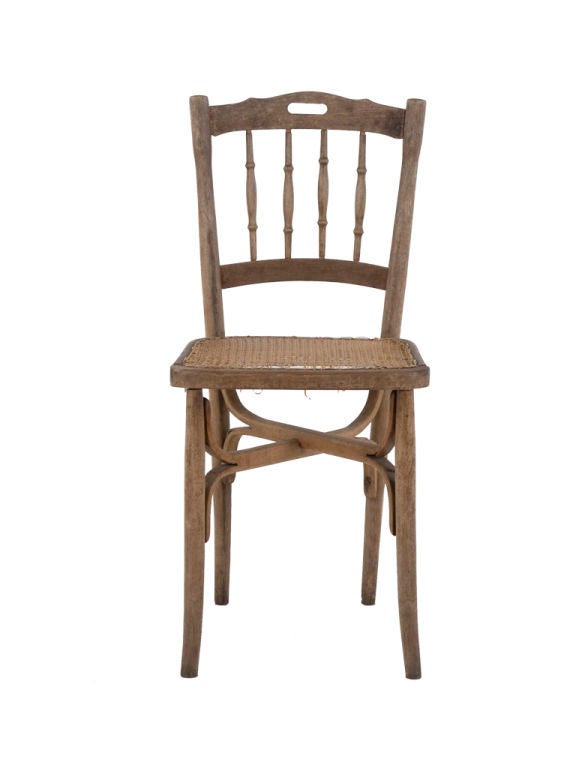Charming kitchen chair. Original cane seat.