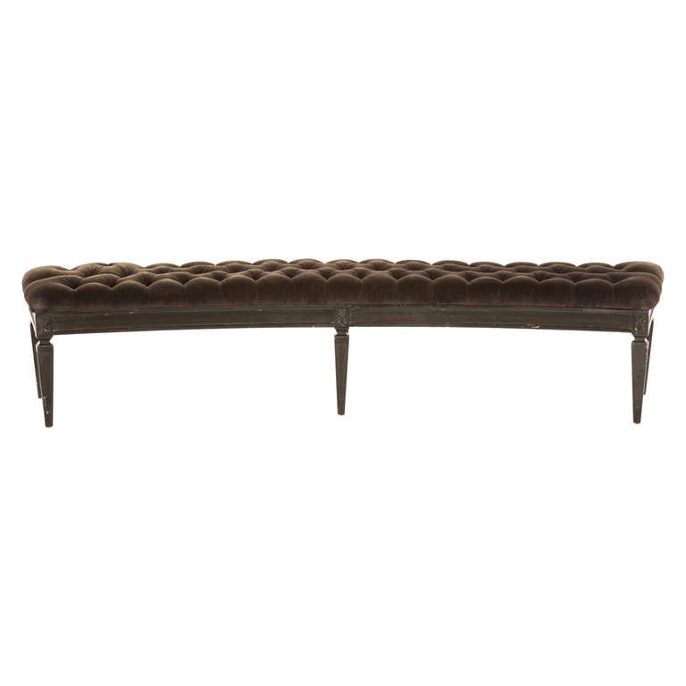 vintage curved bench. tufted velvet upholstery as found. painted wood base as found.