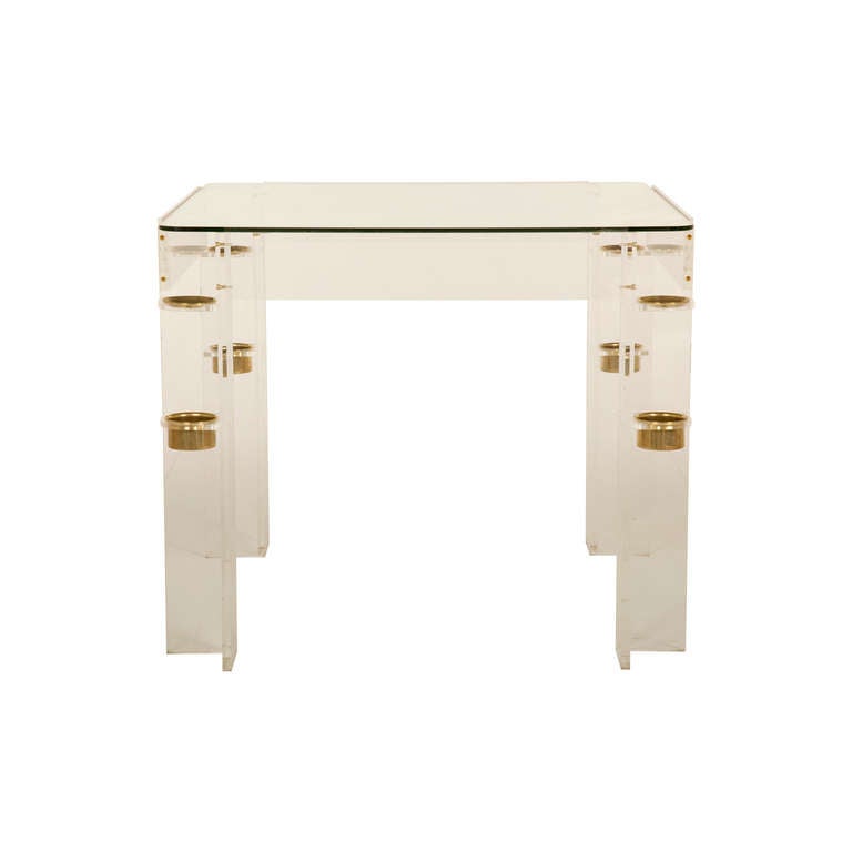 vintage game table. lucite frame with original glass top. includes brass cup holders and ashtrays.