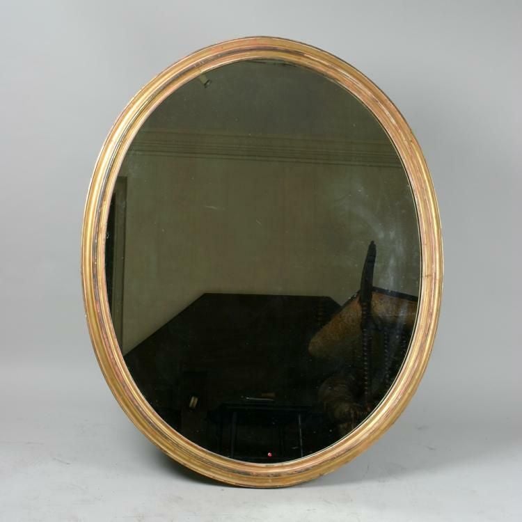 A 19th century gilt oval mirror, English