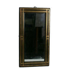 Ebonised and gilt morror