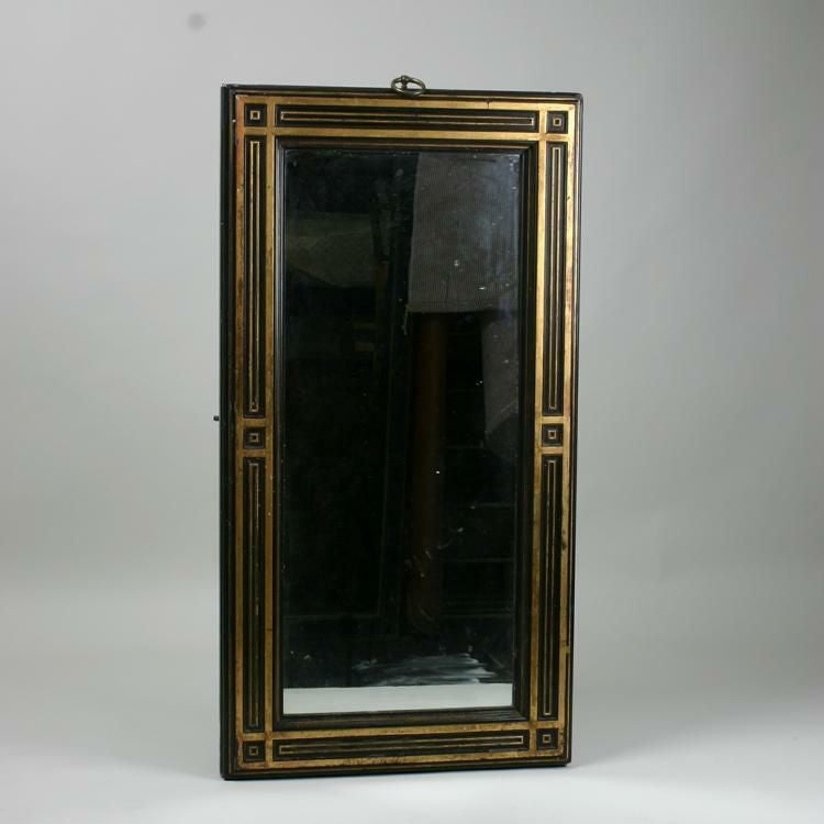 Ebonised and gilt morror