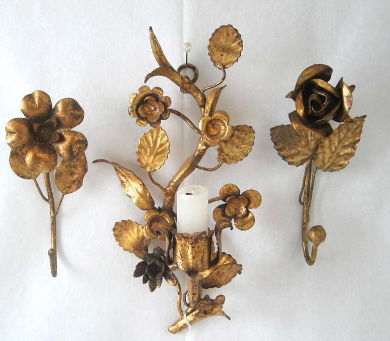 Beautiful Made in Italy Gilt Petite  floral candle holder sconce and two petite flowers. Ideal for a small powder room! Or use in dressing room hang necklaces and light a candle as you dress for the evening!

It is about 10 1/2