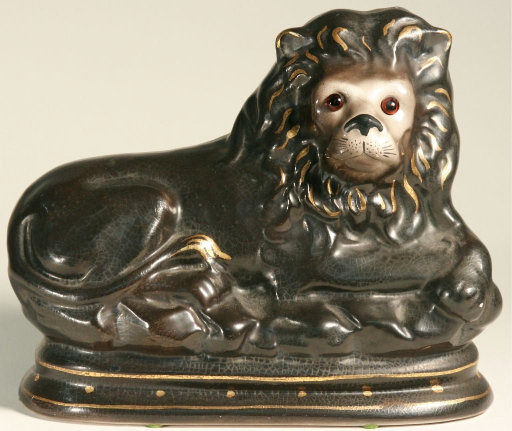 English Pair of Antique Staffordshire Recumbent Lions