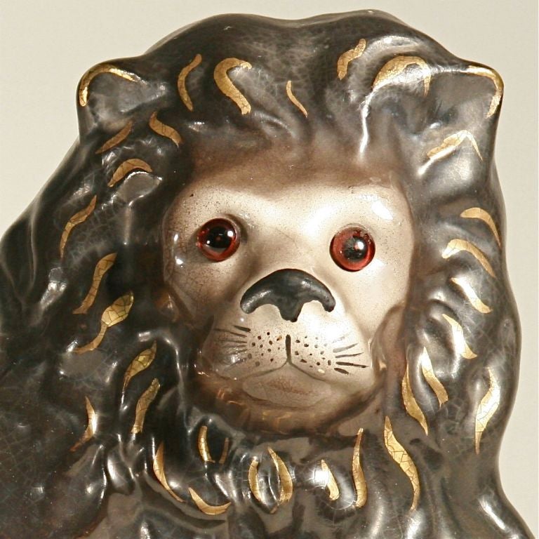 Ceramic Pair of Antique Staffordshire Recumbent Lions