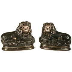 Pair of Antique Staffordshire Recumbent Lions