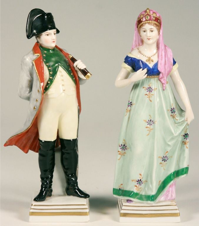 A beautifully detailed pair of porcelain figurines of Napoleon and Josephine. Capo-Di-Monte porcelain was first made in Naples, Italy, from 1743-1759. Since 1821, the Doccia Factory of Italy has used the original molds to create works of lasting