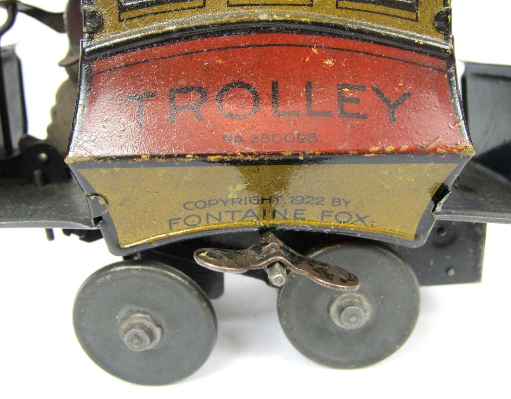This wonderful tin Toonerville Trolley windup toy is a creation of Fontaine Fox, one of the most popular American cartoonists of the 20th Century. The comic strip was created by Fontaine Fox and began in the Chicago Post starting from 1908 and ran