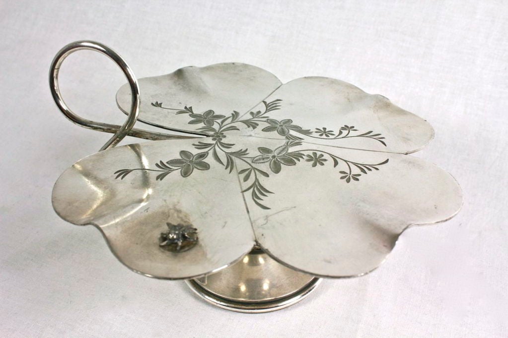 Quadruple silver plated tray dated mid to late 1800's from Rogers, Smith & Co. This clover-shaped tray also features a flower engraving and charming fly adornment.