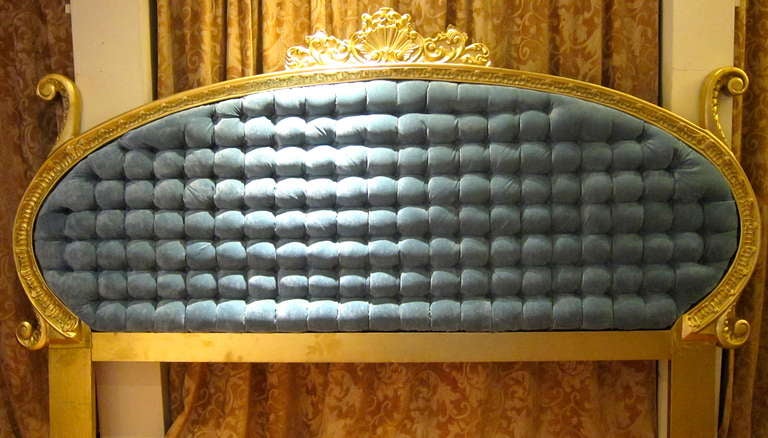 This is a fabulous headboard. Beautiful Blue tufted with ornate gold frame. This piece could use a little TLC in my opinion. The fabric is great ..the frame is excellent but stressing it or adding detailed  paint to it could  bring it 's beauty