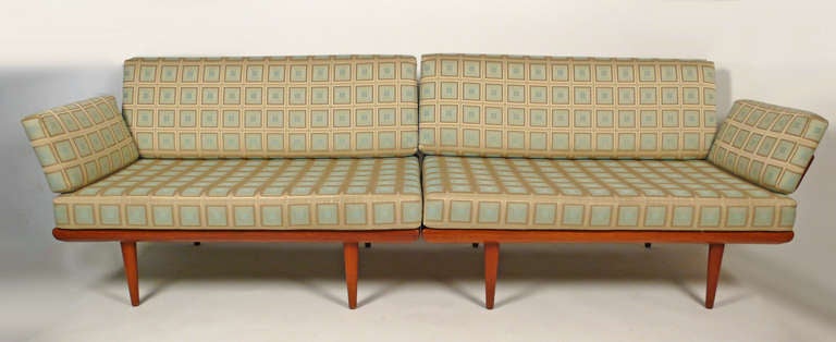Peter Hvidt and Orla Mølgaard-Nielsen two-piece Danish modern sofa. The back cushions are removable to allow for the seat to serve as a daybed. The two sections can easily be attached to one another or used individually.