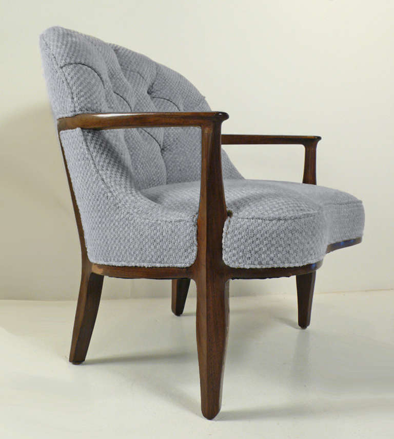 Janus lounge chair designed by Edward Wormley for Dunbar. Solid wood construction with hand tied springs and deep biscuit tufting. This lounge chair exemplifies Wormley's more formal brand of modernism. Extremely comfortable.

Chair shown in most