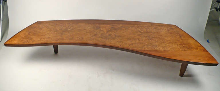 Rare and Impressive cocktail/coffee Table model 200-84W Designed by George Nakashima for Widdicomb. Contructed of burled Carpathian elm, walnut and rosewood and features a Bull in the bookmatched Carpathian elm which is visible in the photos. Table