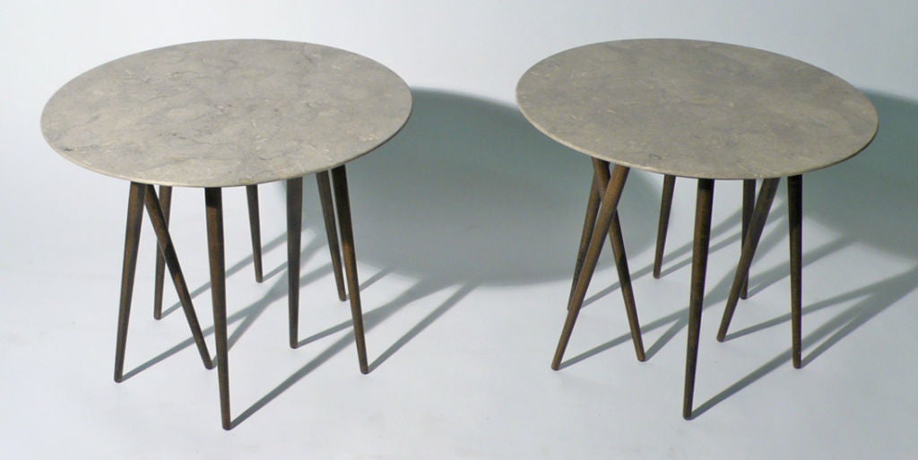 Pair of Toothpick Tables were designed by Lawrence Laske for Knoll in 1993. This pair has two custom knife edge stone tops with a honed finish. One table retains the original label. This design bridges the gap between sculpture and furniture.
