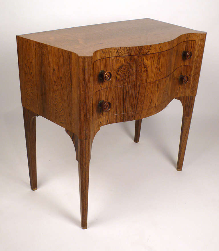 Rare Dunbar commode designed by Edward Wormley and executed in bleached brazilian rosewood. Model no. 6335 Cabinet has a recessed latch on the rear that lock the drawers and prevents them from opening. The lathe turned solid rosewood hardware is