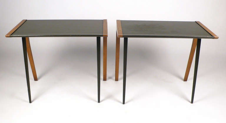 Unique Mid-century Modern cantilever side tables designed by John Van Koert for Drexel Model no. K74-4. Each table features the original hunter green finish complimented by the tone of the bleached mahogany legs.