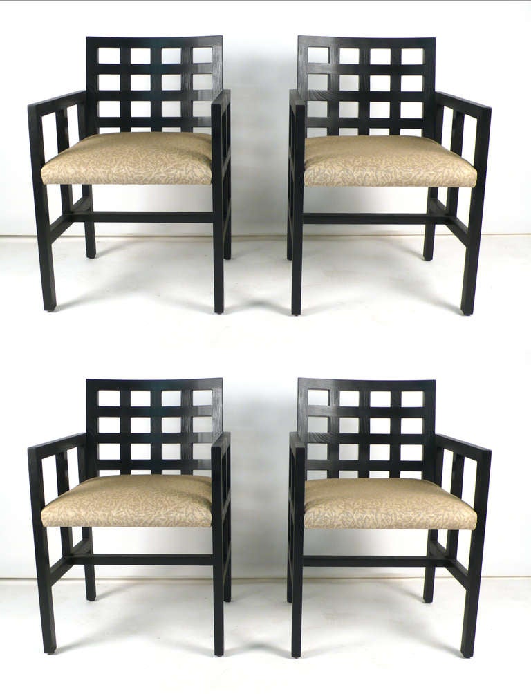 Suite of four Ward Bennett ebonized ash armchairs. Produced by Brickel Associates. 

These masterfully well constructed chairs are the epitome of architectonic illusionism. Crafted in the timeless vernacular of Richard Meier with a nod to the