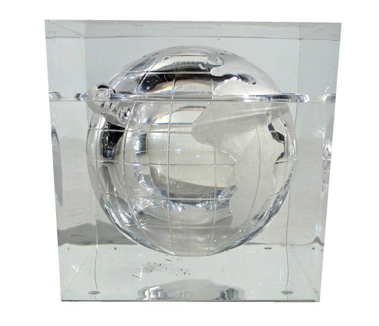 In the manner of Alessandro Albrizzi. Vintage lucite ice bucket with internal globe and orbiting moon. Very well preserved. No scratched or yellowing.