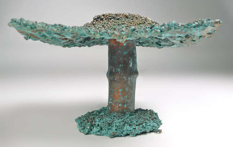 Melted bronze shot into panel as mushroom head on heat pressed copper tube stem on bronze shot melted base.

Sold with COA.