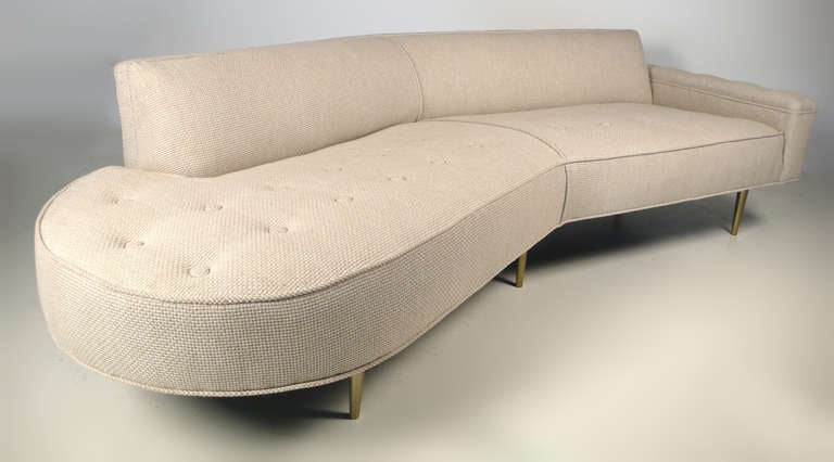 Early and scarcely seen Harvey Probber sofa with gold anodized spun aluminum legs and sexy, curvaceous lines. This sofa has been completely restored with no expense being spared. All of the eight way hand tied springs have been re-tied, the foam has