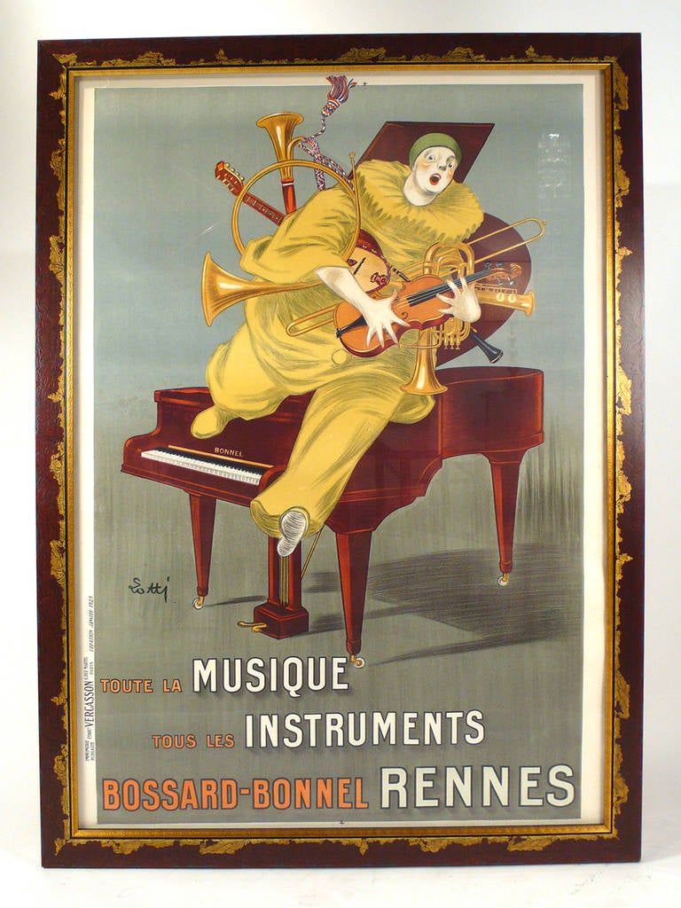 This original linen-backed Musique Instruments Rennes stone lithograph circa 1925 has been beautifully custom framed and mounted. Lotti only created a few posters during his career and the 