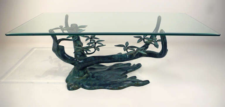 This cast bronze cocktail table sculpture with a beautiful verdigris patina attributed to Willy Daro. Purchased in Paris, France.

Base measurements 33