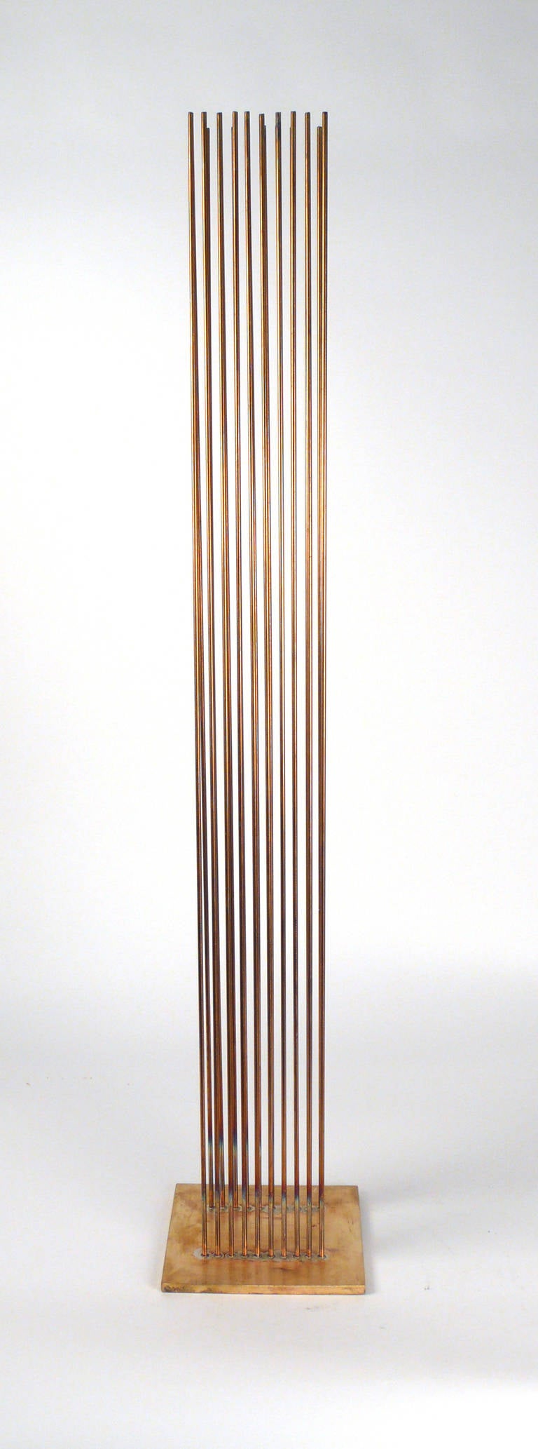 20 beryllium, copper rods in two separate rows silvered to brass base. Have CoA.

This sculpture produces sound. Please contact us for a youtube link.
