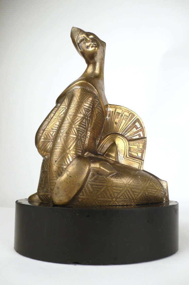 Stylized bronze figurative sculpture by french artist Ervand Kotchar. Also spelled Yervand Kochar.