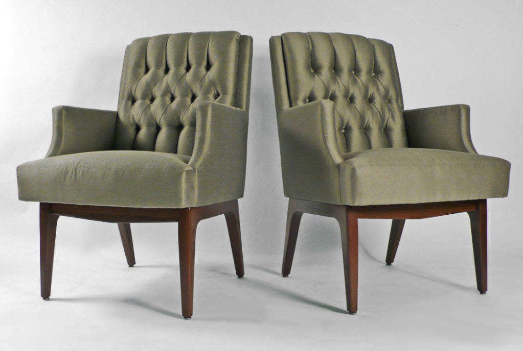 Pleat tufted easy chairs designed by Jens Risom. Recently reupholstered and re-foamed. Bases have been refinished in a satin finish. Price is for the pair.