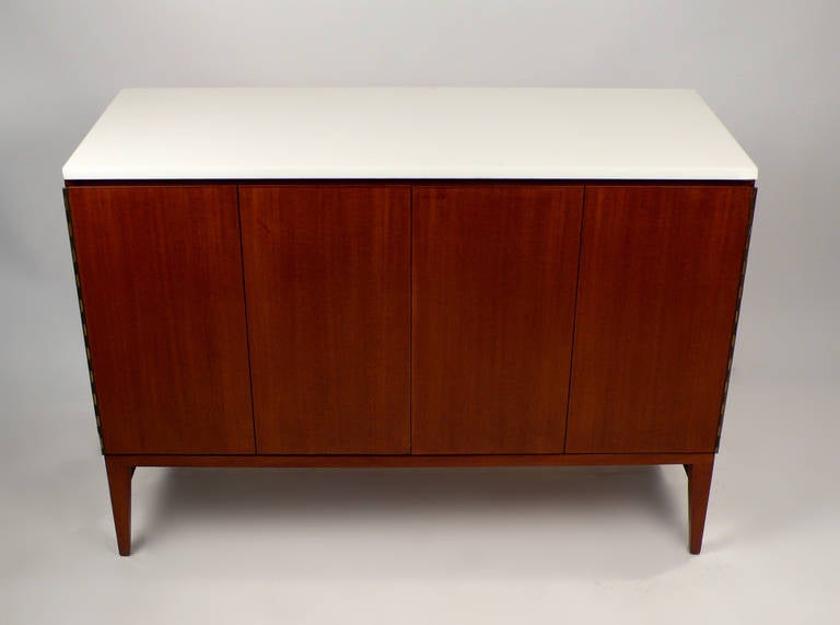 Credenza designed by Paul McCobb from the Irwin Collection with original milk glass top.