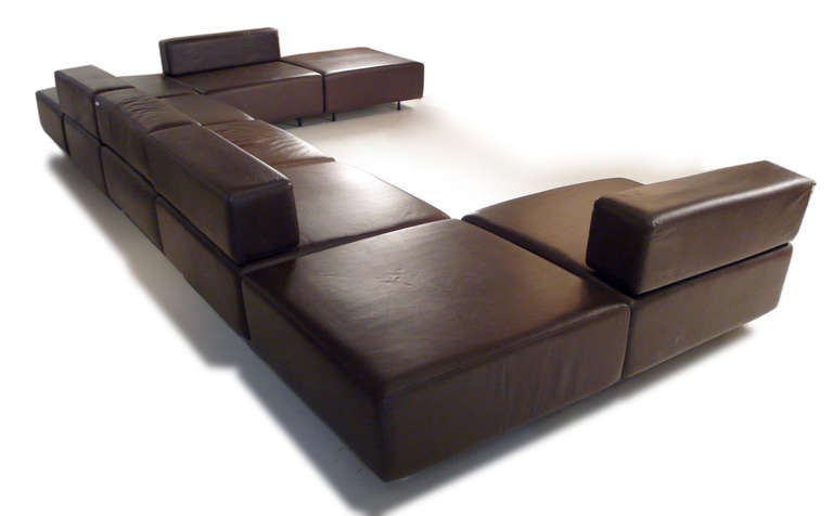 Eight sections of Harvey Probber designed 'CUBO' modular seating. Set includes five seating units and three ottomans. The sectional is easily positioned into a number of interesting configurations.