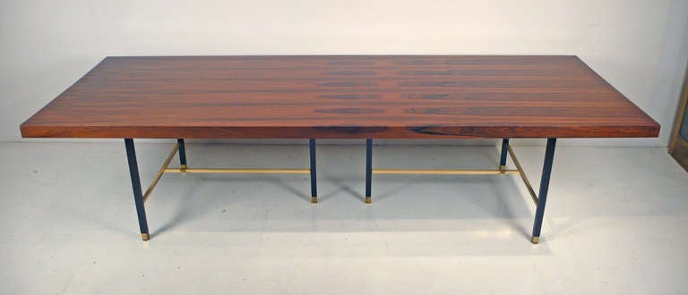Custom, monumental dining table designed by Harvey Probber.