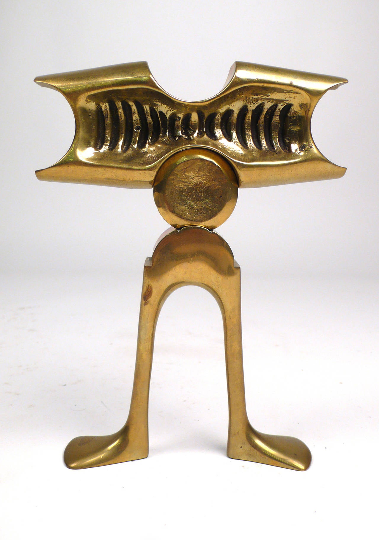 Solid brass modular tabletop sculpture by Israeli modernist Aharon Bezalel. Titled 'man for play' and number 9 from an edition of 200. Signed and dated to foot. Designed to be interactive and to spawn creativity.