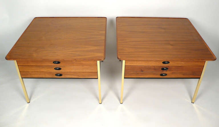 This is a pair of oversized end/side tables/nights stands with three drawers designed by Milo Baughman for Arch Gordon. Image number 5 is the closest to the actual tone of the wood. Both units have been professionally refinished and all of the solid