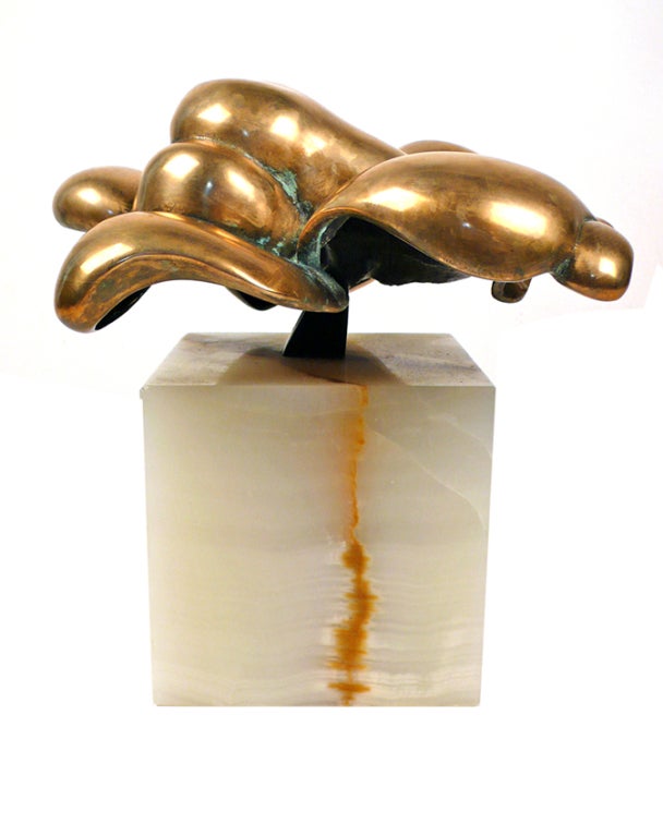 Polished Bronze Abstract sculpture by Leitner.  Number 6 from an edition of 15. If you look closely you will find a hidden female nude within the composition. A stunning work mounted to a block of solid onyx.