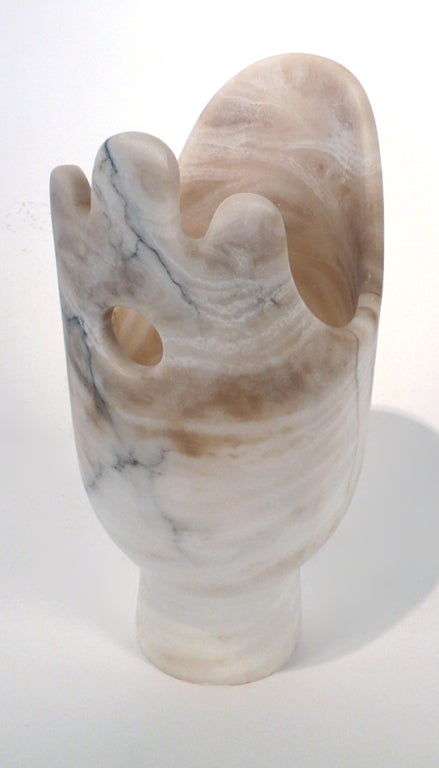Stunning hand carved translucent alabaster vase purchased in Italy in the 1950s. Very much in the flavor of Angelo Mangiarotti.  Artist undocumented. Marked Italy.
