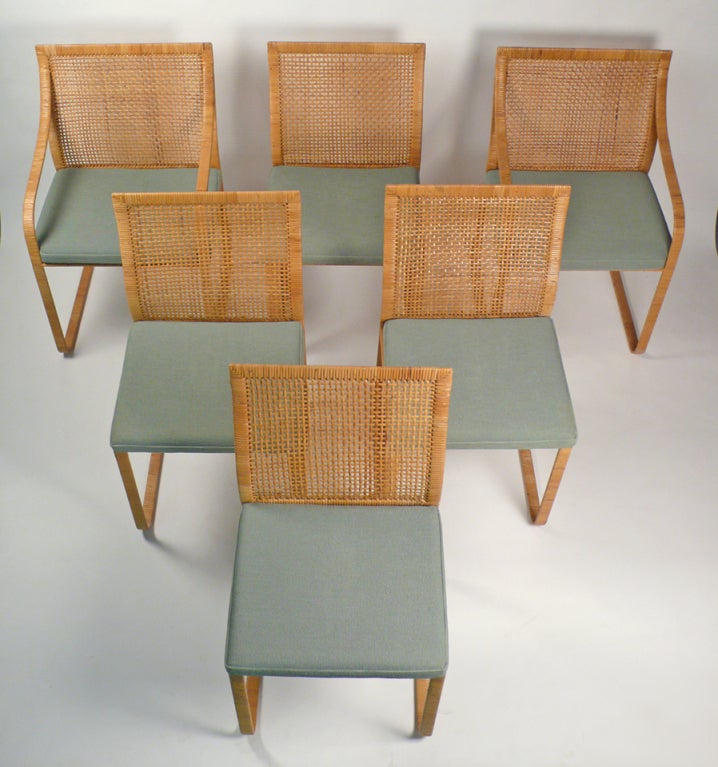 Six Dining Chairs designed by Harvey Probber. Set consists of two arm chairs and four side chairs. Stainless and Cane Construction, Excellent Original Condition